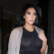 Kim shows off breast in a black see-through dress
