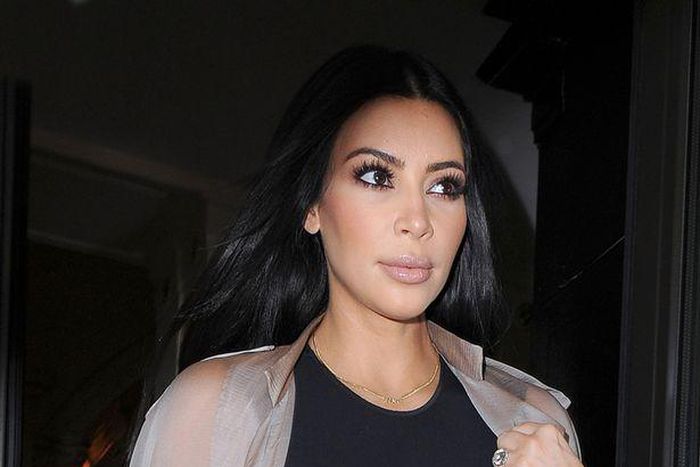 Kim shows off breast in a black see-through dress