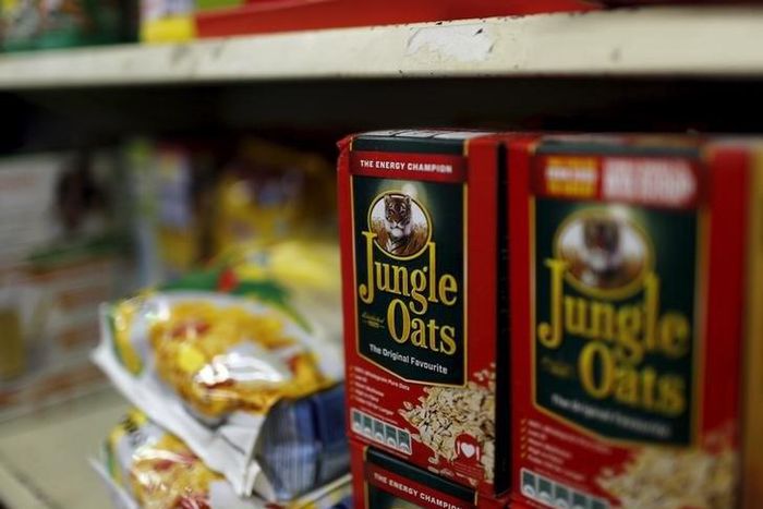 Boxes of Jungle Oats, one of South Africa's Tiger Brands original products, sit on a shelf in a Cape Town convenience store, November 19, 2015.