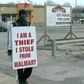 Man opt for wearing 'I Am a Thief' sign over going to jail