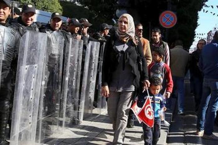 Tunisia police, protesters clash in several towns over jobs