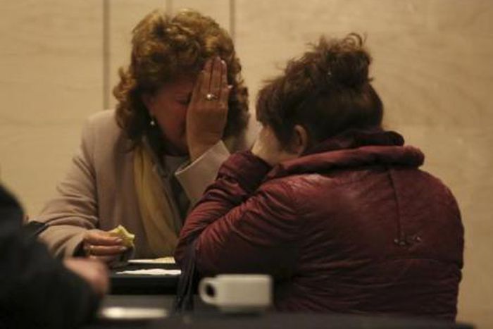 Relatives of victims of a Russian airliner which crashed in Egypt, mourn at a hotel near Pulkovo airport in St. Petersburg, Russia, October 31, 2015. The Airbus A321, operated by Russian airline Kogalymavia under the brand name Metrojet, carrying 224 p...