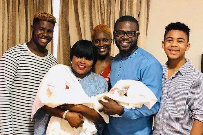 Funke Akindele joins her family, who now include newborn twins, in an intimate picture. - Instagram/funkejenifaakindele