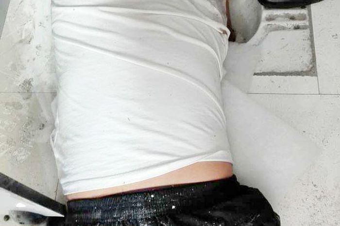 Man gets arm stuck in a filthy toilet public toilet while trying to retrieve new smartphone