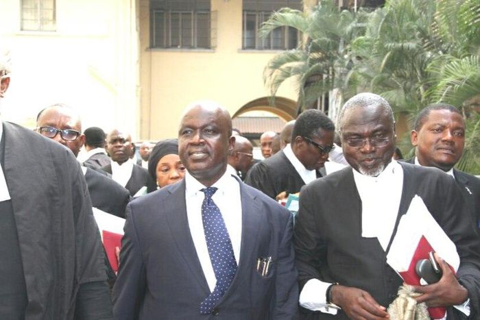 Rickey Tarfa (middle) with a group of lawyers