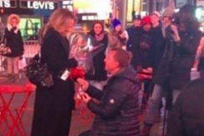 Brendan Rodgers proposes to Charlotte Searle at Times Square in New York