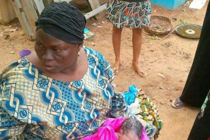 The abandoned baby being bathed