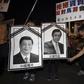 A pro-Taiwan activist attempts to burn portraits of Taiwan"s President Ma Ying-jeou (R) and Chinese President Xi Jinping while protesting against the upcoming Singapore meeting between Ma and Xi, outside Taipei Songshan airport, November 7, 2015.