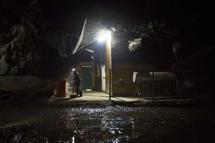 A miner sweeps the floor underground at the Chibuluma copper mine in the Zambian copperbelt  region in a file photo. REUTERS/Rogan Ward