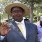 Uganda's incumbent President Yoweri Museveni displays his inked finger after casting his vote at a polling station during the presidential elections in Kirihura in western Uganda, February 18, 2016. REUTERS/James Akena