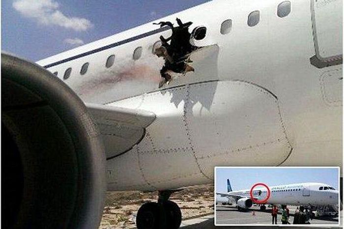 Man on fire sucked out of Somalian plane after explosion