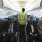 A member of Daallo Airlines ground crew walks down an aisle inside their airline at Aden Abdule International Airport in Somalia's capital Mogadishu in a file photo. REUTERS/Feisal Omar