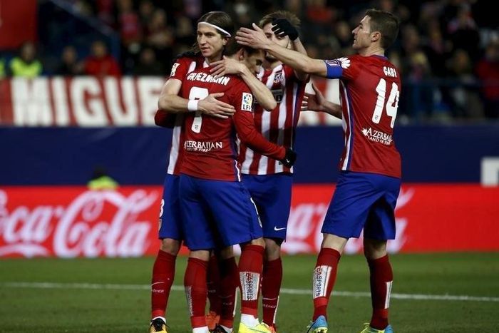 Atletico win 3-0 to close gap to Barcelona