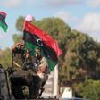 Members of the Libyan army give protection to a demonstration in support of the Libyan army under the leadership of General Khalifa Haftar, in Benghazi, Libya, August 14, 2015. REUTERS/Esam Omran Al-Fetori