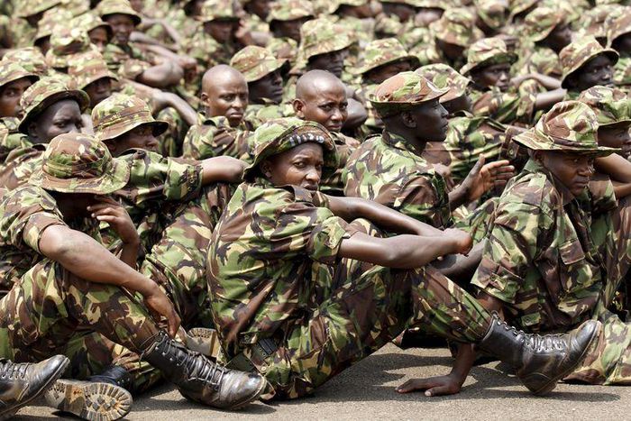 Members of the Kenya Defence Forces attend prayers as they pay their respects to the Kenyan soldiers serving in the African Union Mission in Somalia (AMISOM), who were killed in El Adde during an attack, at a memorial mass at the Moi Barracks in Eldore...