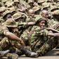 Members of the Kenya Defence Forces attend prayers as they pay their respects to the Kenyan soldiers serving in the African Union Mission in Somalia (AMISOM), who were killed in El Adde during an attack, at a memorial mass at the Moi Barracks in Eldore...