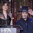 Dakota Johnson and Johnny Depp at the Hollywood Film Awards