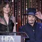 Dakota Johnson and Johnny Depp at the Hollywood Film Awards