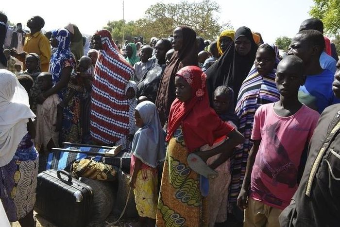 Families from Gwoza, Borno State, displaced by the violence and unrest caused by the insurgency, are pictured at a refugee camp in Mararaba Madagali, Adamawa State, February 18, 2014. REUTERS/Stringer