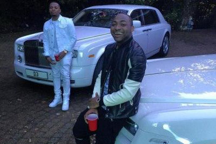 Davido and Olamide on set of 'The Money'.