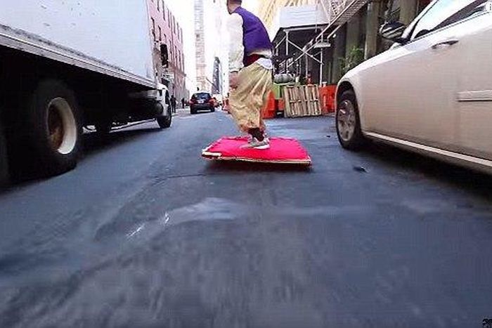 Watch Real life Aladdin glides down the street in a 'flying carpet'