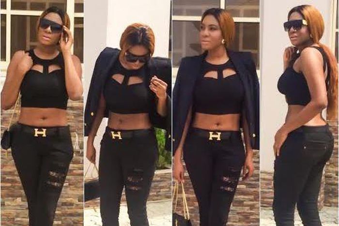 Chika Ike shows off her mid riff in an all black look