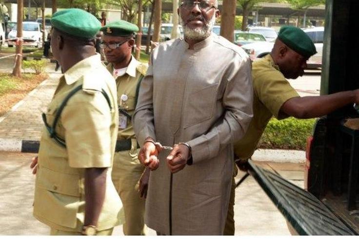 Olisa Metuh arrives Abuja court in handcuffs on January 19, 2016.
