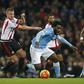 Manchester City's Wilfried Bony in action with Sunderland's Lee Cattermole
Reuters / Andrew Yates
Livepic