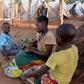 Mozambican child refugees prepare food at Kapise camp in Malawi's Mwanza district January 18, 2016.   REUTERS/Eldson Chagara