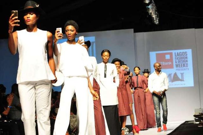 Mai Atafo takes a bow at the 2014 LFDW