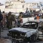 Islamist group kills 30 in twin blasts in Somali town