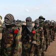 Members of al Shabaab parade at Ala Yaasir camp, outside of Somalia's capital Mogadishu, September 3, 2011. REUTERS/Feisal Omar