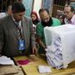 Employees count ballots after polls closed in the first phase of parliamentary elections at a voting center in Dokki, Giza governorate, Egypt, October 19, 2015. REUTERS/Asmaa Waguih