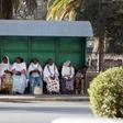 Passangers wait for public transport at a bus-stop in Eritrea's capital Asmara, February 20, 2016. ERITREA-POLITICS/ REUTERS/Thomas Mukoya