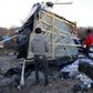 Migrants dismantle a makeshift shelter as they move in the camp known as "The Jungle" in Calais, France, January 17, 2016, after authorities asked them to evacuate part of the site close to a highway and a road. REUTERS/Pascal Rossignol