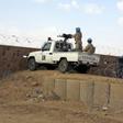 Peacekeepers stand guard at the entrance to the Minusma peacekeeping base in Kidal, Mali, July 22, 2015. REUTERS/Adama Diarra