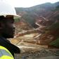 An employee stands in an open pit at Banro's Twangiza mine in eastern Congo, September 28, 2011. REUTERS/Tom Kirkwood