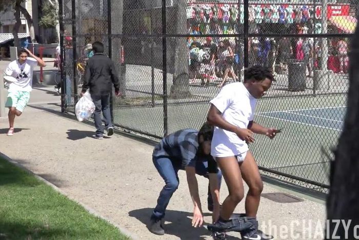 Watch hilarious pulling down people's pant prank