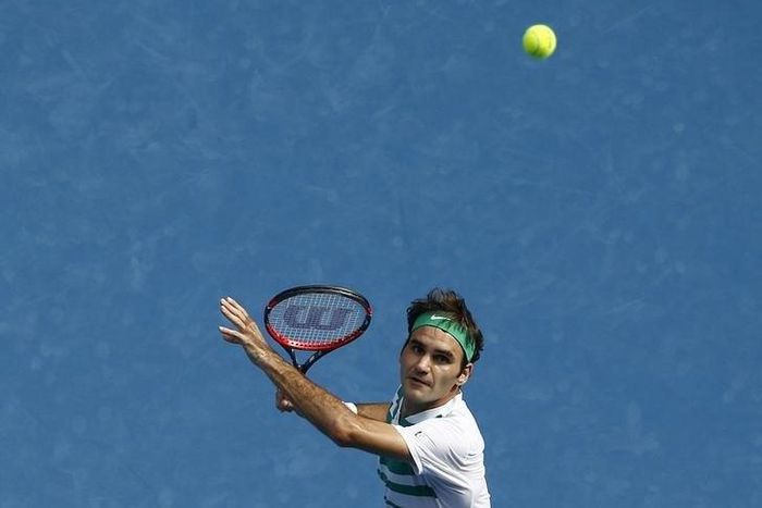 Switzerland's Roger Federer prepares to hit a shot during his quarter-final match against Czech Republic's Tomas Berdych at the Australian Open tennis tournament at Melbourne Park, Australia, January 26, 2016. REUTERS/Jason Reed
