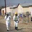 Workers are seen at a hostel in a file photo REUTERS/Siphiwe Sibeko