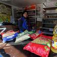 A worker sells subsidized food commodities at a government-run supermarket in Cairo, Egypt, February 14, 2016. REUTERS/Mohamed Abd El Ghany
