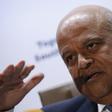 South Africa's Finance Minister, Pravin Gordhan gestures during a media briefing after he was reappointed to the position on Sunday night by President Jacob Zuma in Pretoria, South Africa December 14, 2015. REUTERS/Siphiwe Sibeko