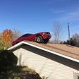 83-year old Woman shocked to find a car parked on the roof of her house