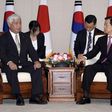 Japan tries to ease South Korea's concern over military role