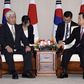 Japan tries to ease South Korea's concern over military role