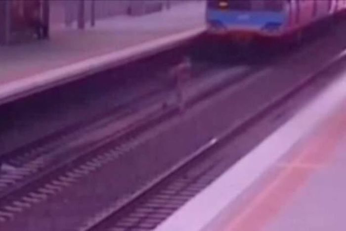 Man escapes death after he ran across railway tracks