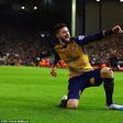 Olivier Giroud celebrates after scoring against Liverpool