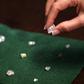 A visitor holds a 17 carat diamond at a Petra Diamonds mine in Cullinan, outside Pretoria, in a file photo. REUTERS/Siphiwe Sibeko