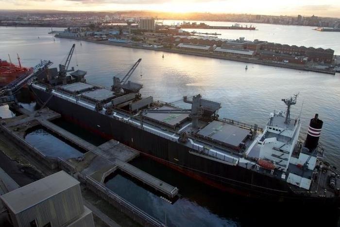 Grain is loaded aboard ships for export in Durban, Africa's busiest port, in this file photo.