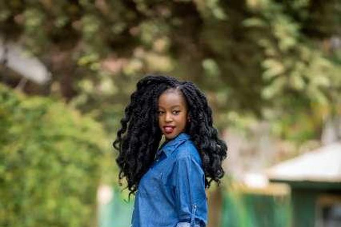 Diana Machira takes on a bold look with an oversized denim shirt over denim pant